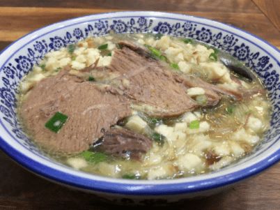 解锁美食新吃法：乌啦啦狂炫烙馍卷羊肉的奇妙体验