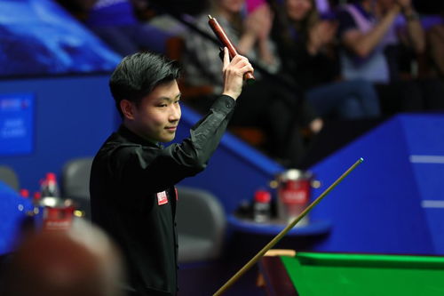 赵心童在比赛中庆祝得分