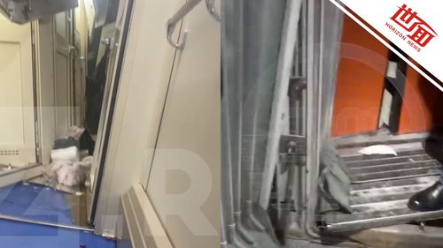 乘客在车厢内等待救援