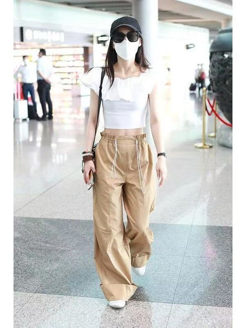 黄圣依机场穿搭