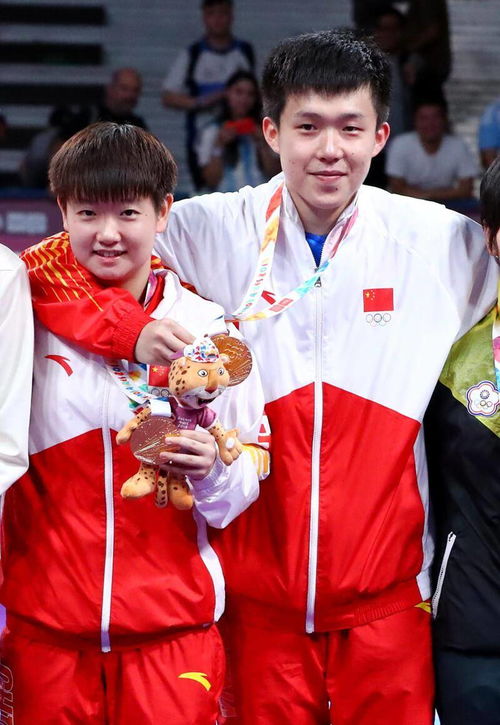 王楚钦与孙颖莎赛场瞬间