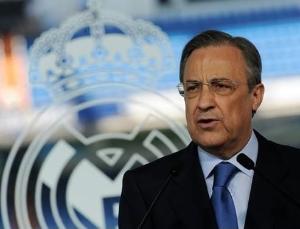 樊振东与皇马主席握手