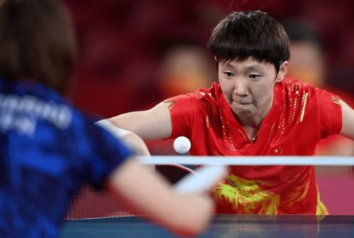 王曼昱与巴赫合影握手