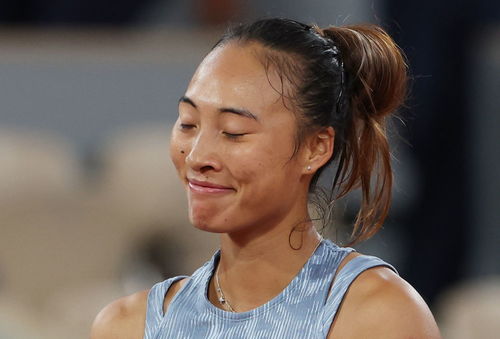 郑钦文在法网庆祝胜利