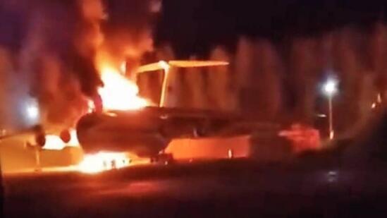 俄军机场遭无人机袭击后起火现场