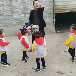 父亲送女儿们上学背影