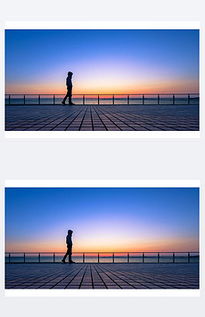 一个人在夕阳下坚定行走的背影