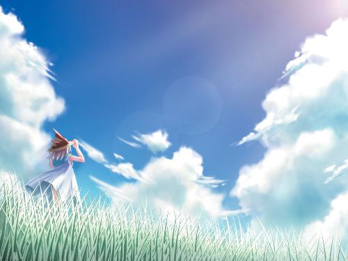 一位青年站在校园里仰望天空