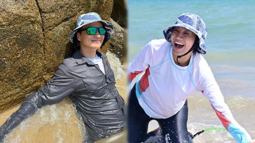 朱丹在海边冲浪摔倒但仍微笑面对镜头