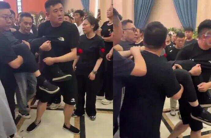 杨议因悲伤过度被抬出灵堂