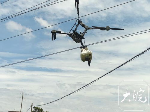 无人机挂在电线上
